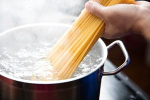 A person starts cooking pasta after learned about the differences between dry and fresh pasta