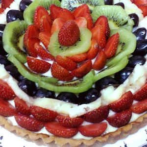 The photo of fruit tart (8-10 portions) to complete your guide on how to host high tea at your home