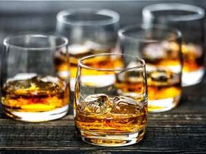 The photo of many glasses of whisky to help the readers understand all essential facts about whisky